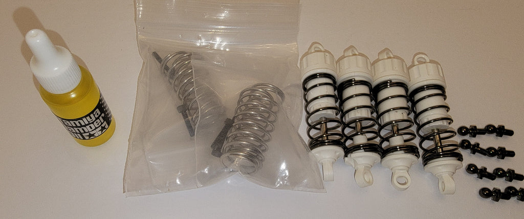 Tamiya Comical Frog OEM Shocks – White Replacement Suspension (Used, Like New)